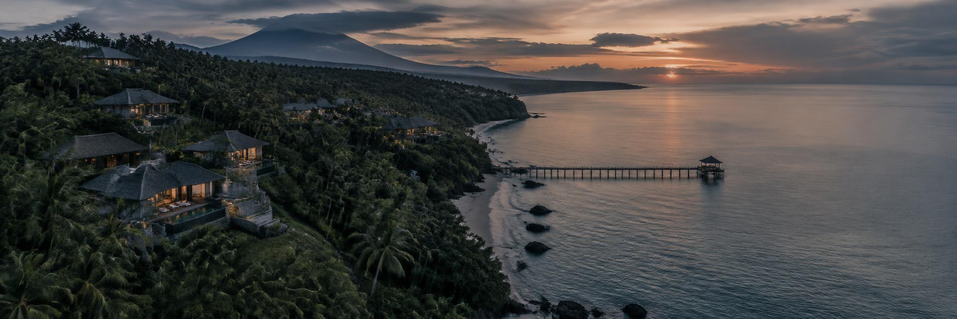 Bali coastline with villas at dusk